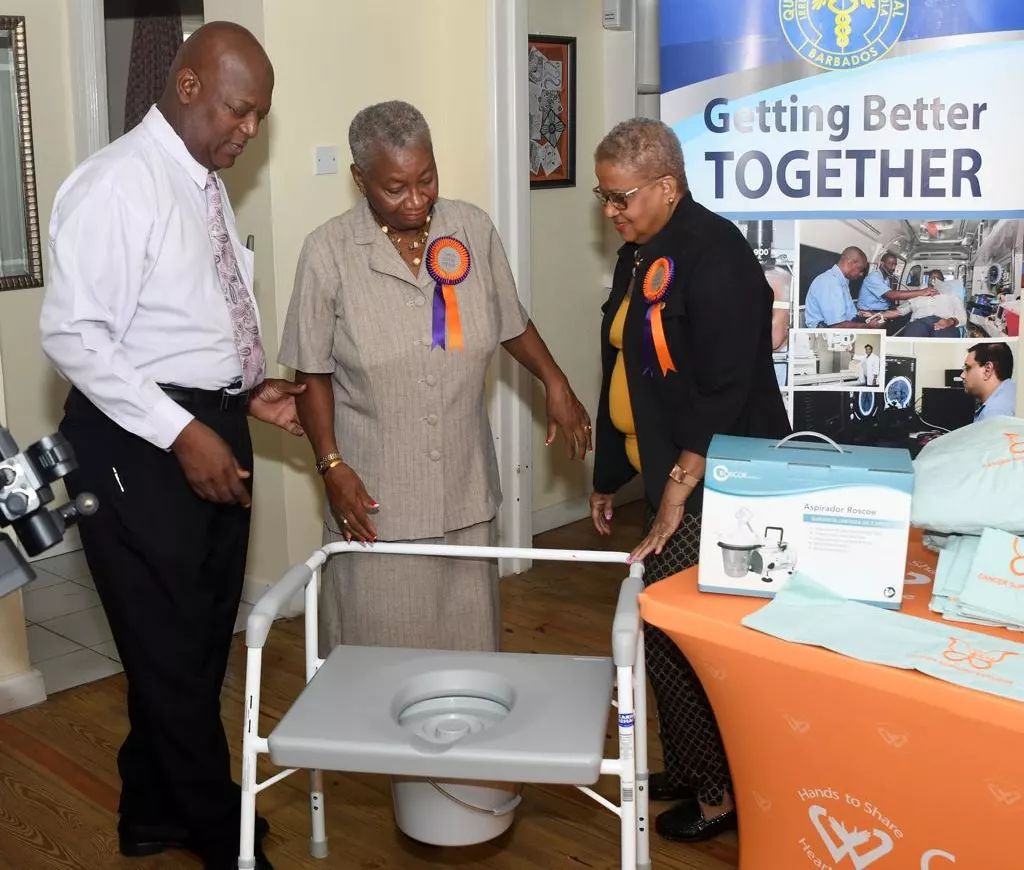 Cancer Support Services presenting a donation of a commode